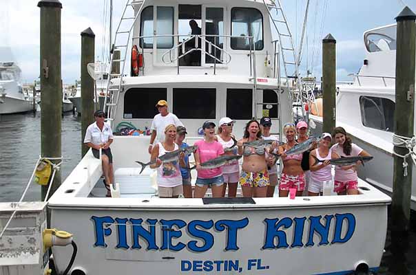 Kids showing off their catches on the Finest Kind Charter Boat