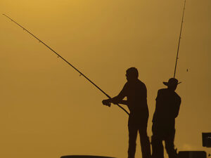 https://www.charterfishingdestin.com/wp-content/uploads/fishermen-silhouette-300x225.jpg